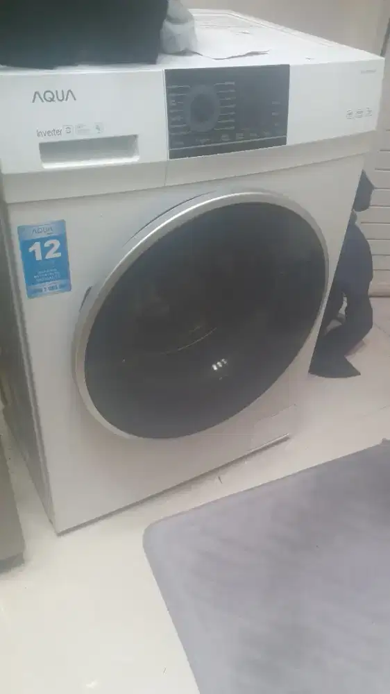 Mesin cuci  front loading Aqua