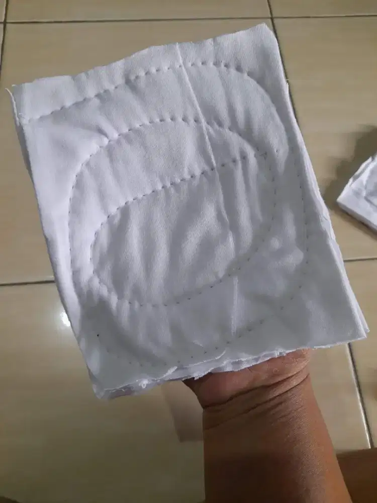 Kain majun putih tumpuk