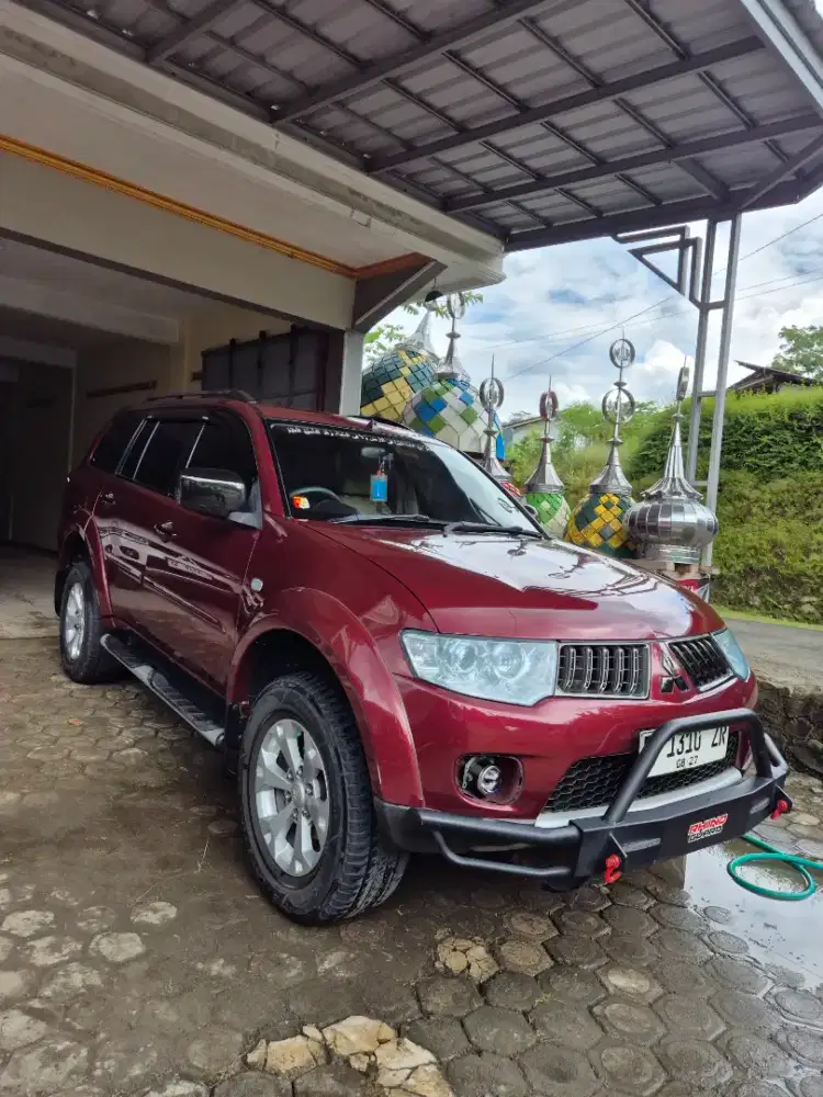 Pajero sport exceed 2009 AT merah marun