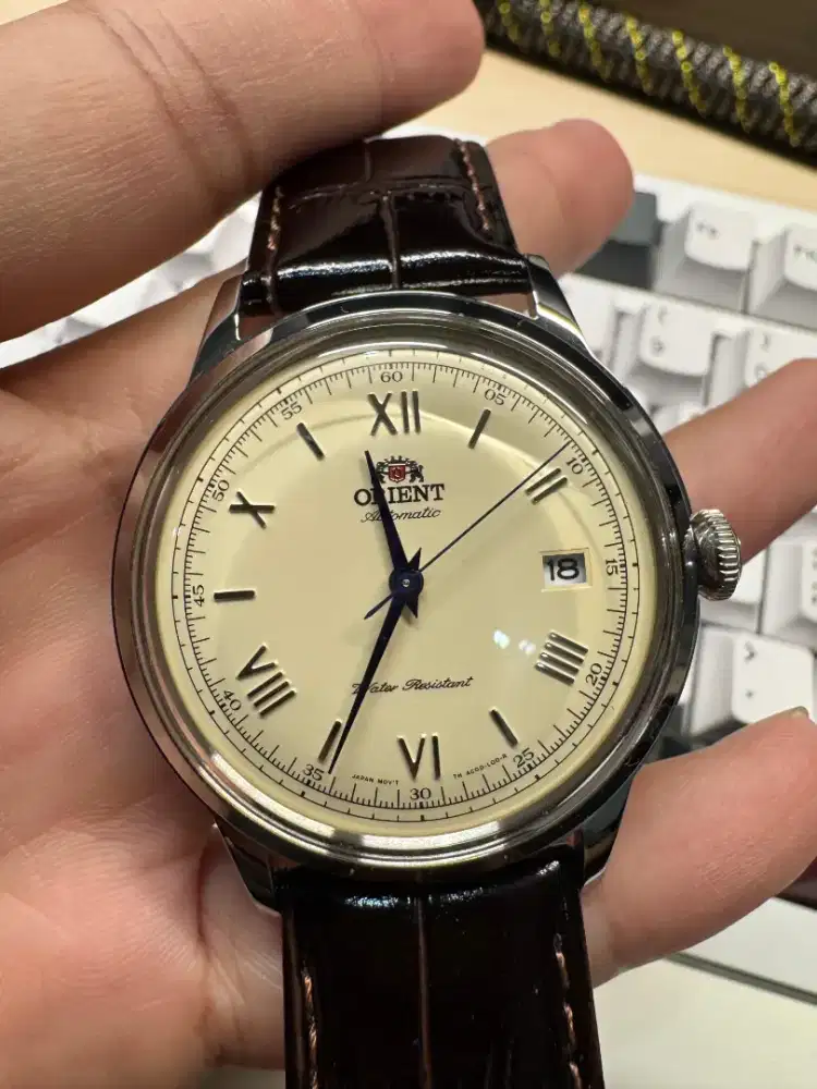 Orient bambino v2 cream dial blue hand not seiko omega longines