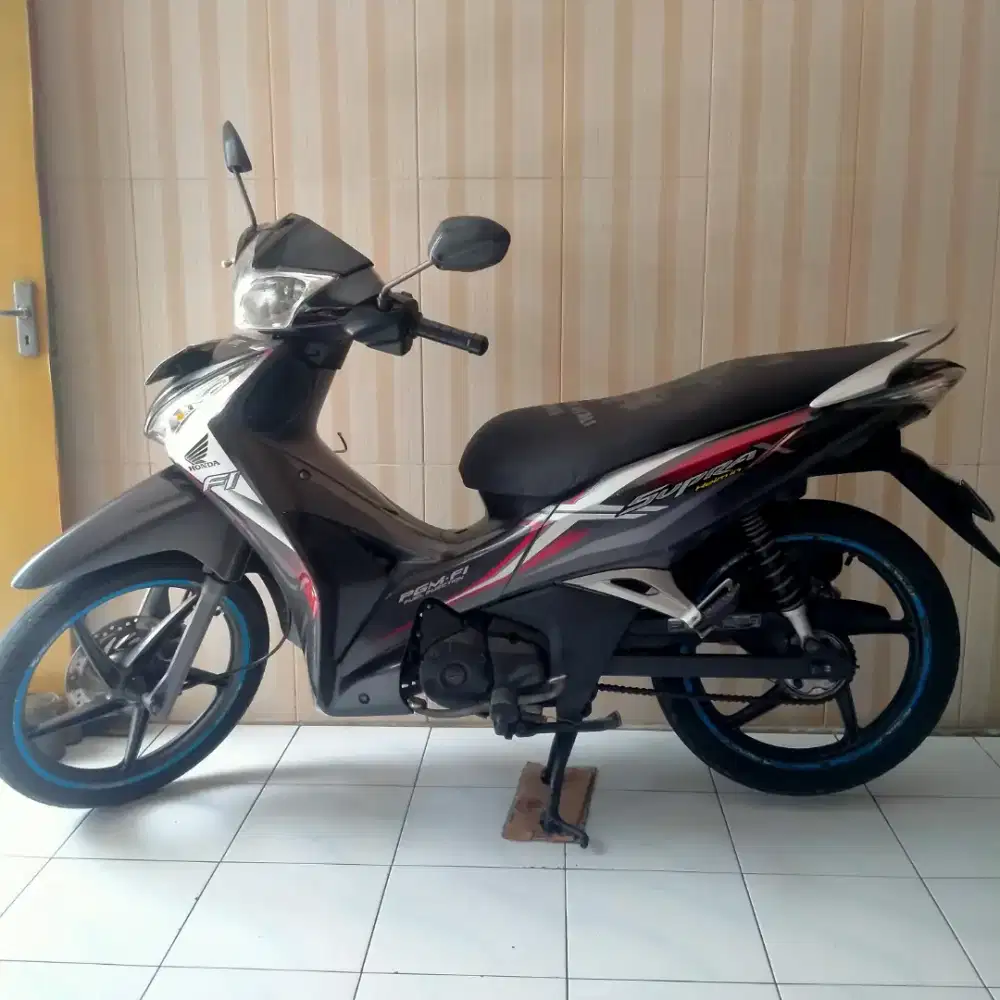 Supra X125 tahun 2014 Helm in