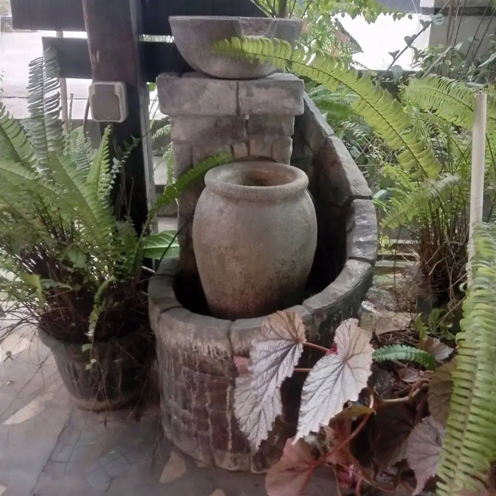 Pancuran Air Batu Sintetis