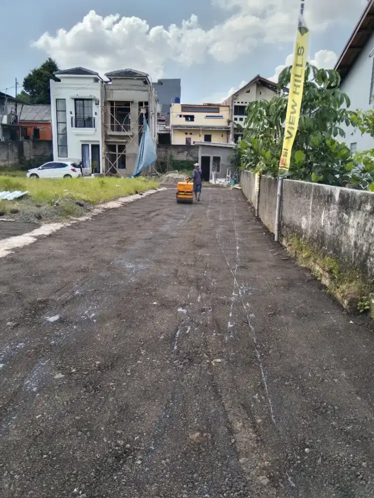 Aspal hotmix lapis jalan perumahan Cilodong