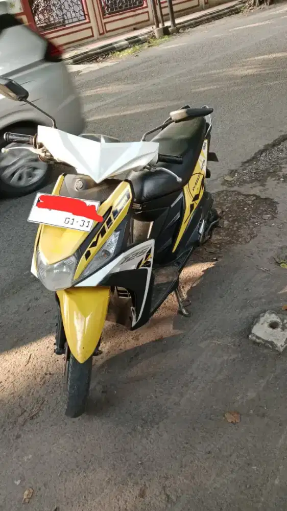 Mio M3 kuning.  Yamaha