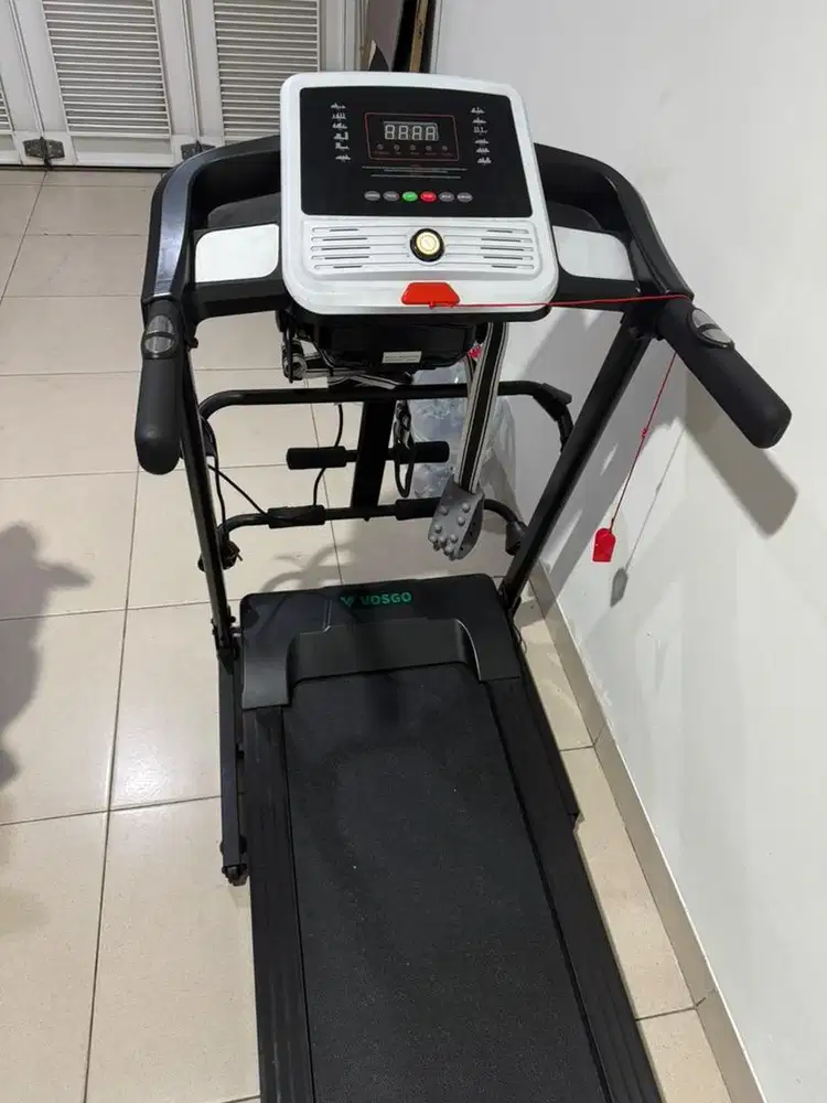 Treadmill include Ikat pinggang getar