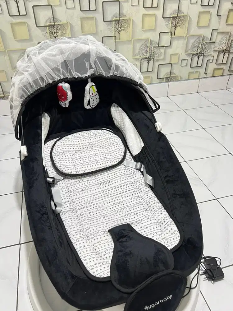 Bouncer bayi bisa pakai listrik atau batrai