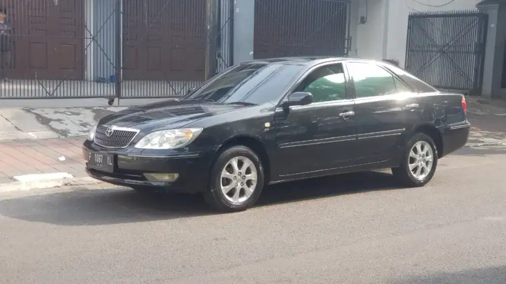 Camri 2.4 tahun 2004 manual warna hitam