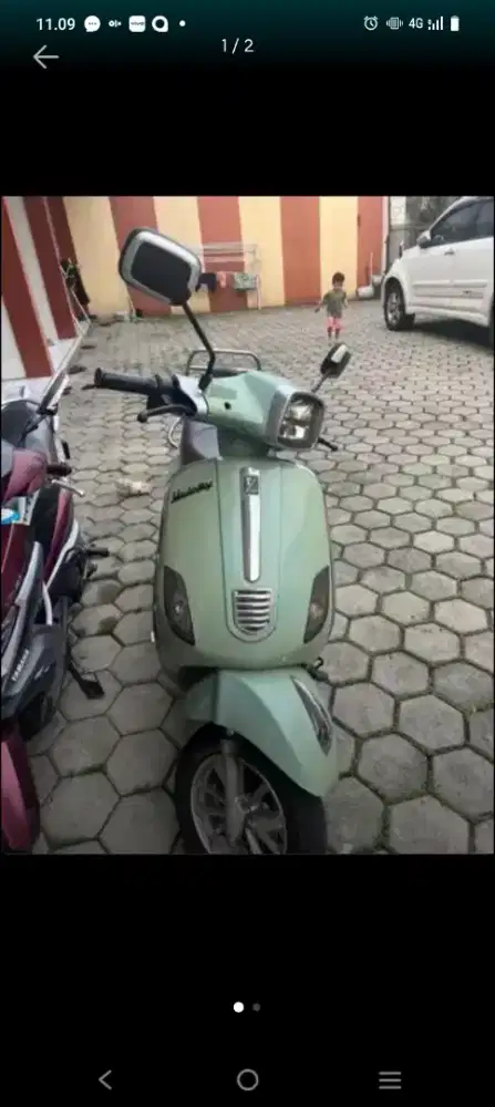 Dijual motor listrik uwinfly warna hijau muda bagus