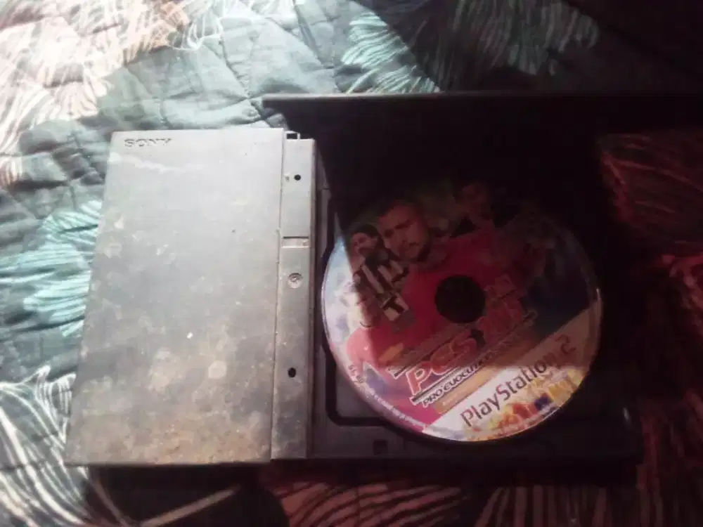 Ps 2 slim masih pake kaset atau cd