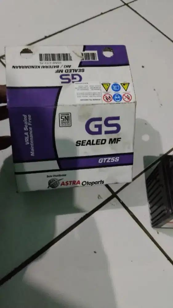 Aki GS baru cuma lepas plastik