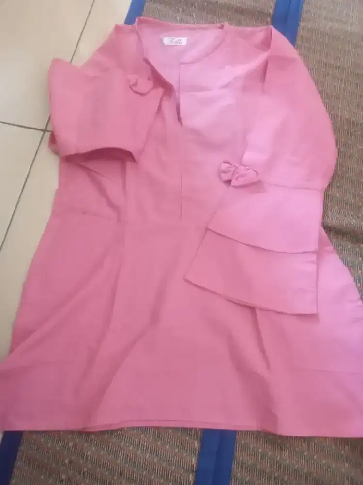 Baju tunik ukuran XL tpi kecil lebih ke L