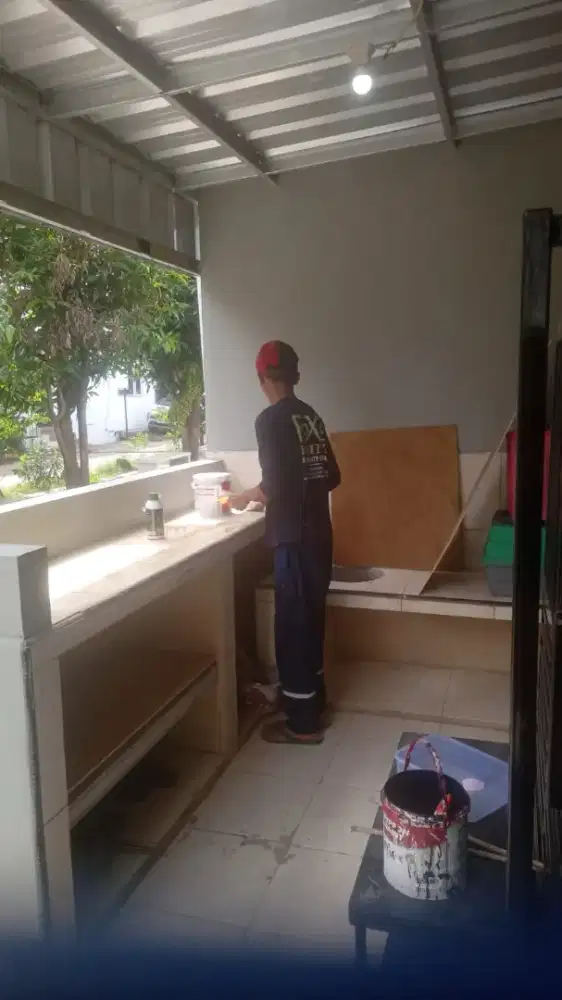 Assisten koki mie ayam