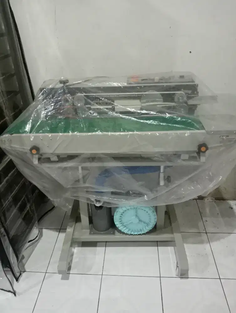 FS-150G Continuous Band Sealer Mesin Segel Plastik Isi Angin WIRAPAX