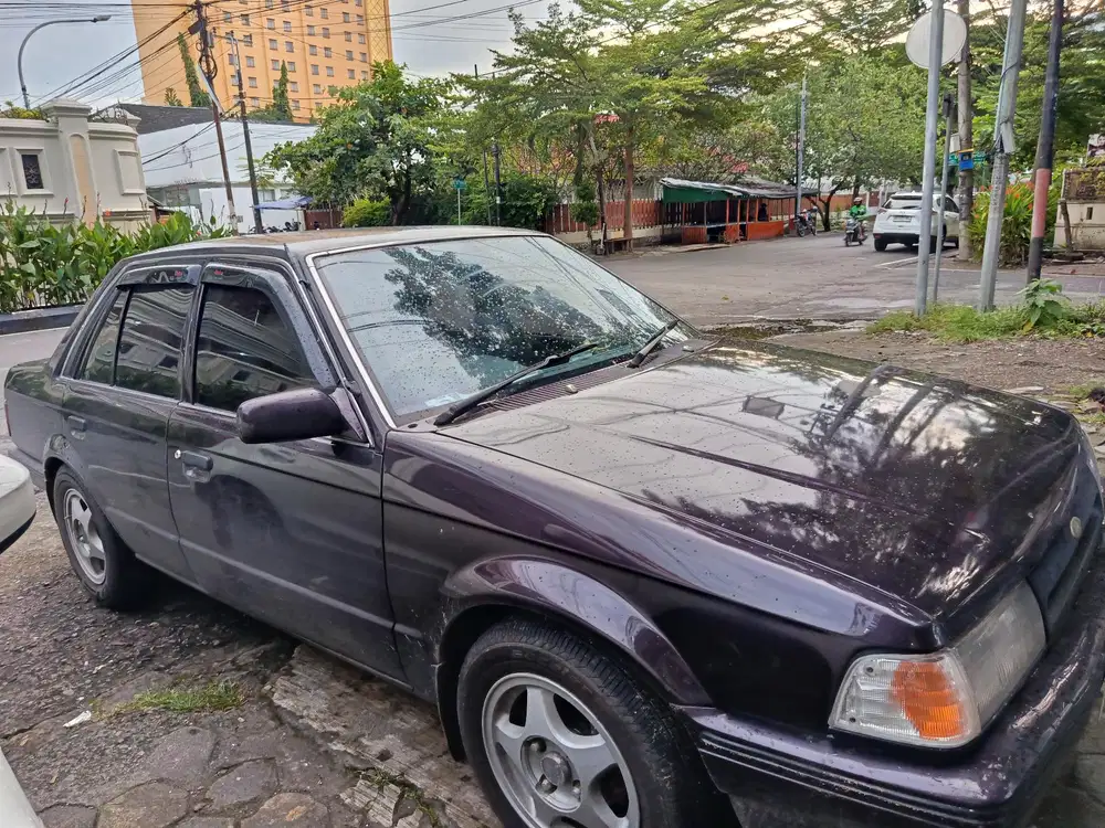 Ford laser 1997 Bensin