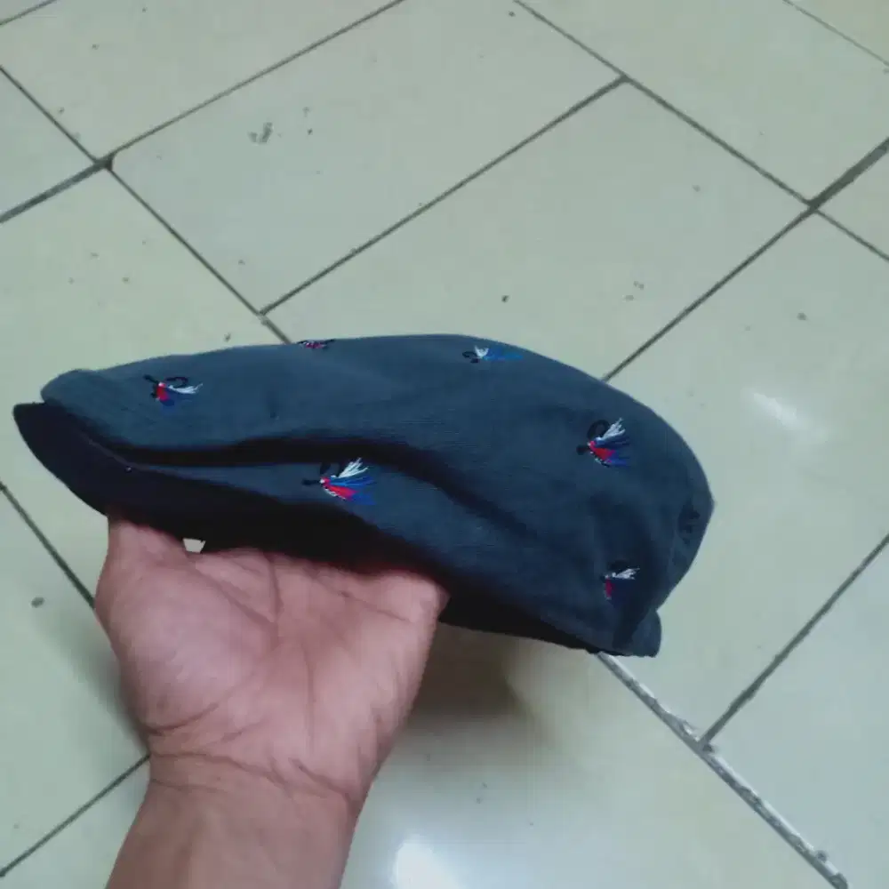 Topi pet the north face tidak ad mines