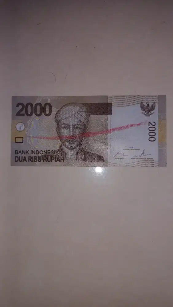 Uang kertas Rp 2000 cetakan unik