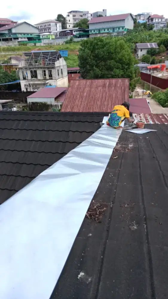 Renovasi atap dan bocoran