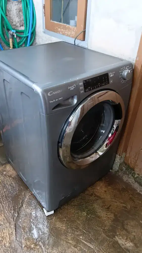 Mesin cuci front loading merk CANDY