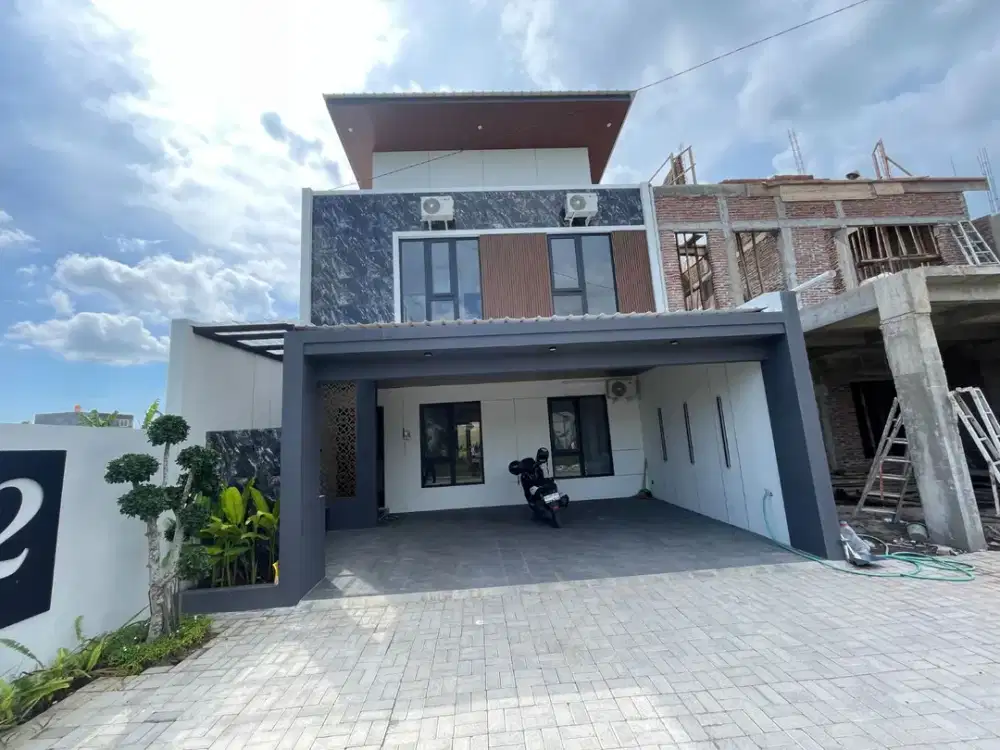Dijual rumah cantik didalam perumahan 2 lantai full furnished , One Gate Depan Jalan Lebar 5M , lokasi maguwo wedomartani