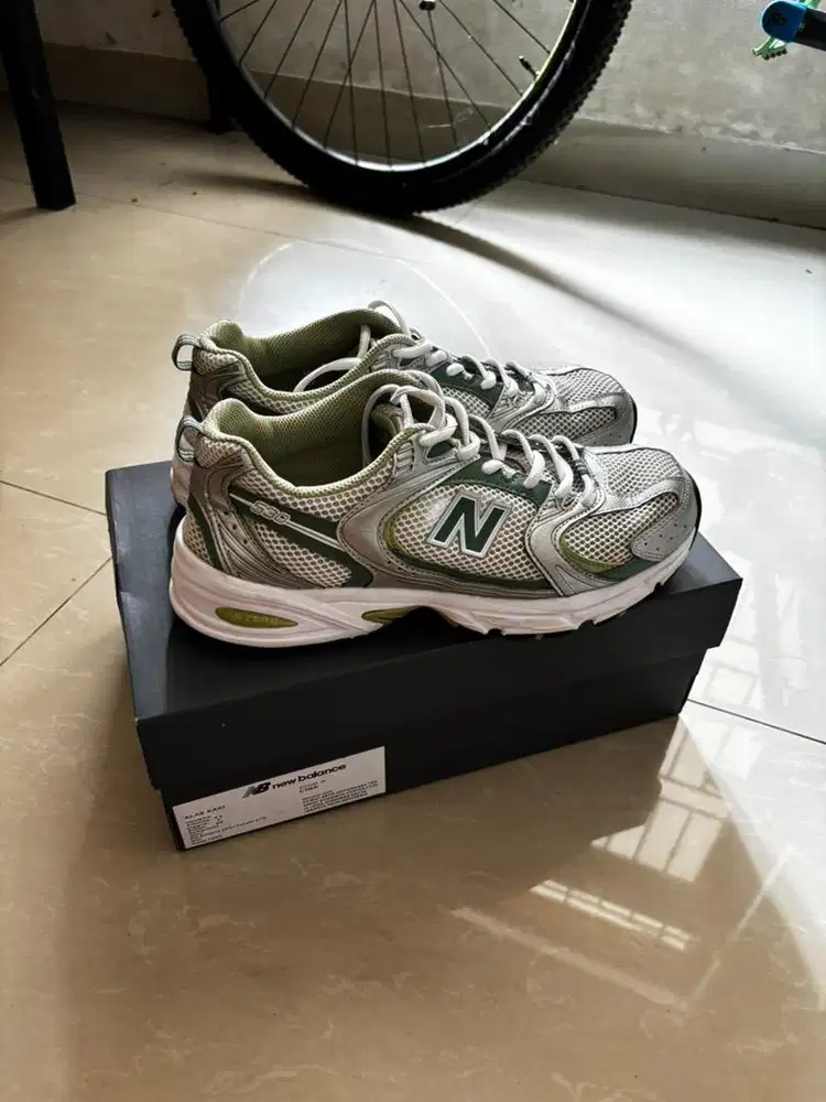 sepatu nb530 green footlocker