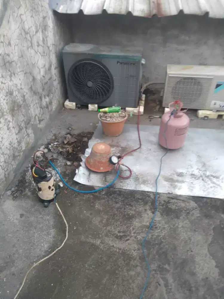Servis ac,isi freon ac,bongkar pasang ac,servis kulkas,water heater