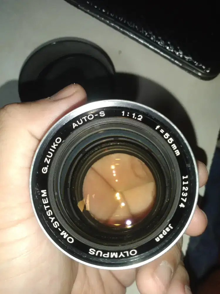 Lensa Olympus 1:1.2 55mm