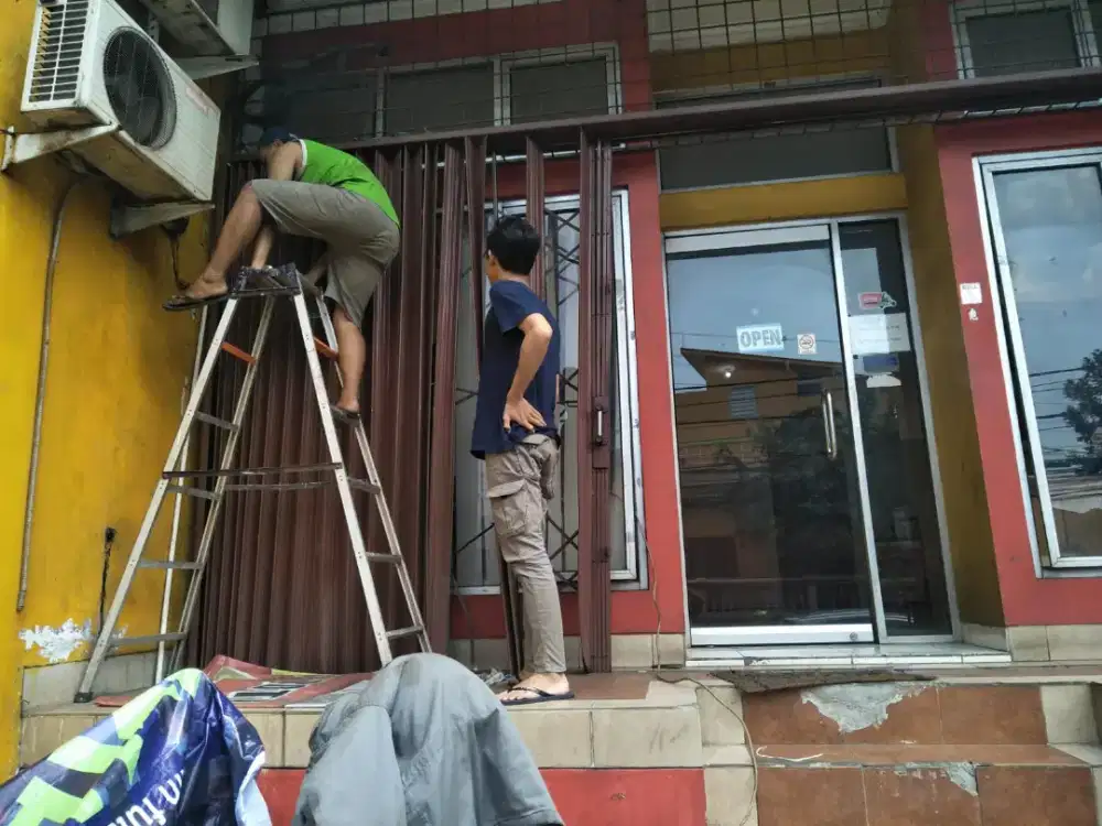 Tukang service rolling door folding gate murah