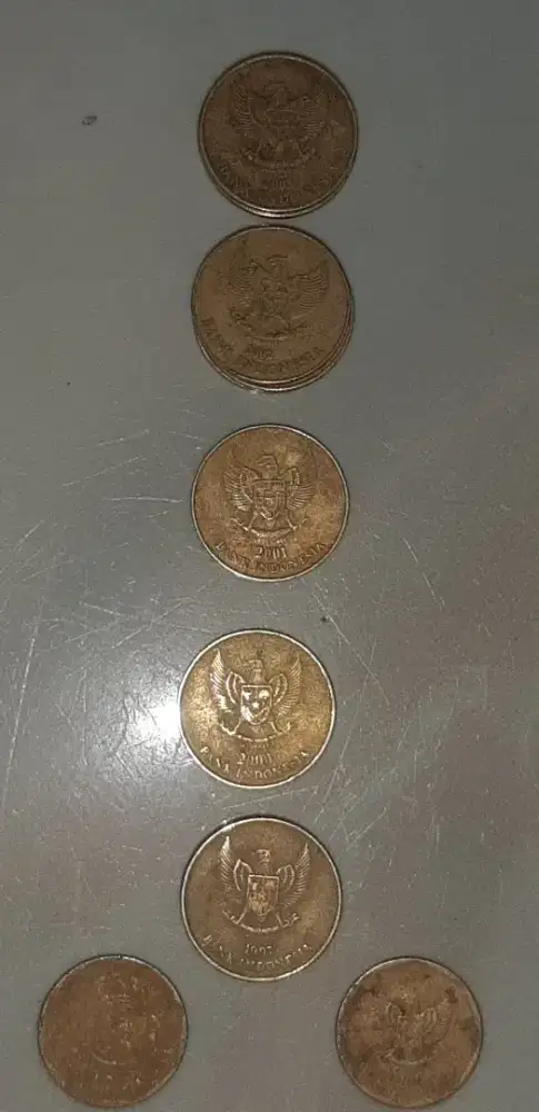 Uang coin lama 500 dan 100