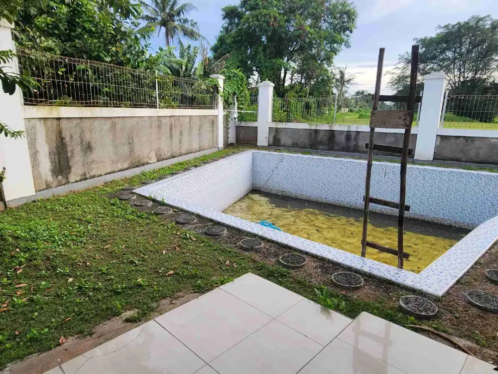 JUAL RUMAH STYLE MEDITERANIA SUVARNA SUTERA  AREA GOLF ada kolam renang
