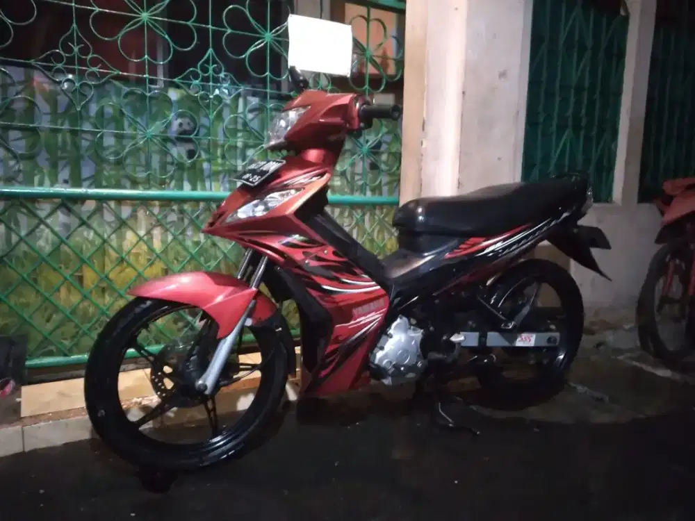 Yamaha Jupiter mx 2010 merah.