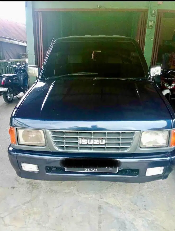 MOBIL ISUZU PANTHER 2.500 ROYAL TAHUN 1999