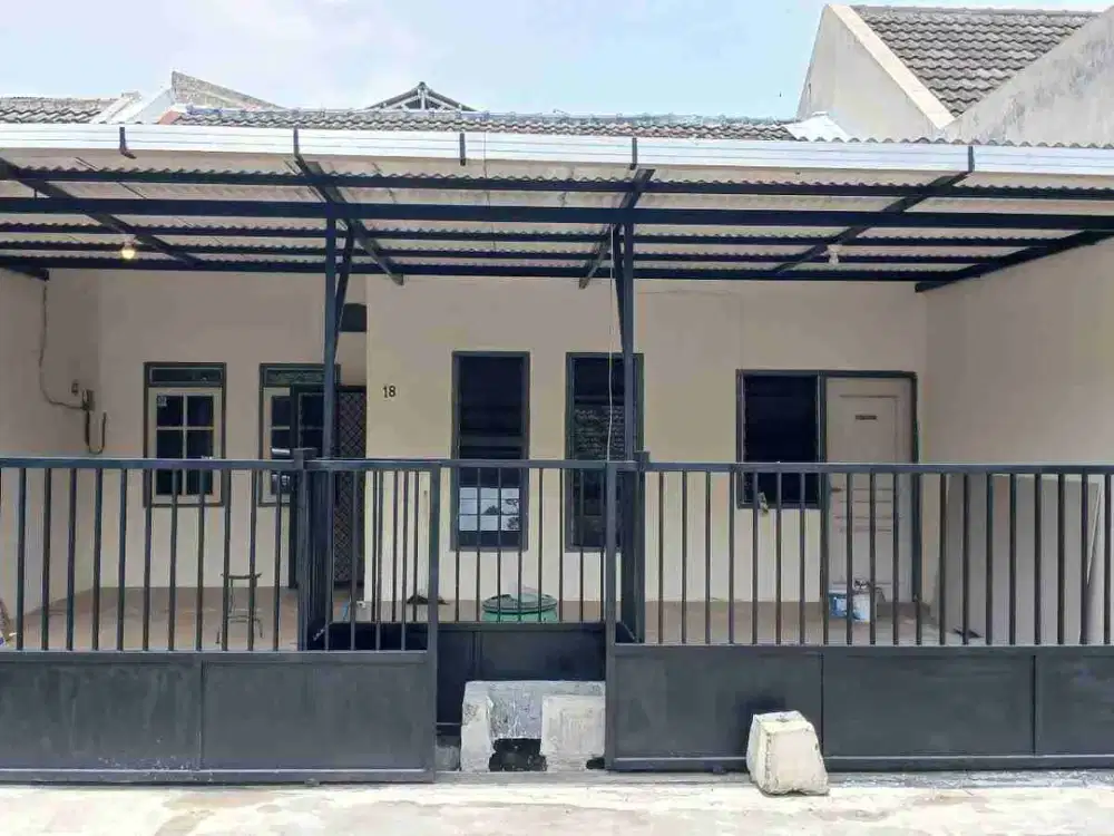jual cepat rumah siap huni Wiguna murah, carport bisa 2 mobil