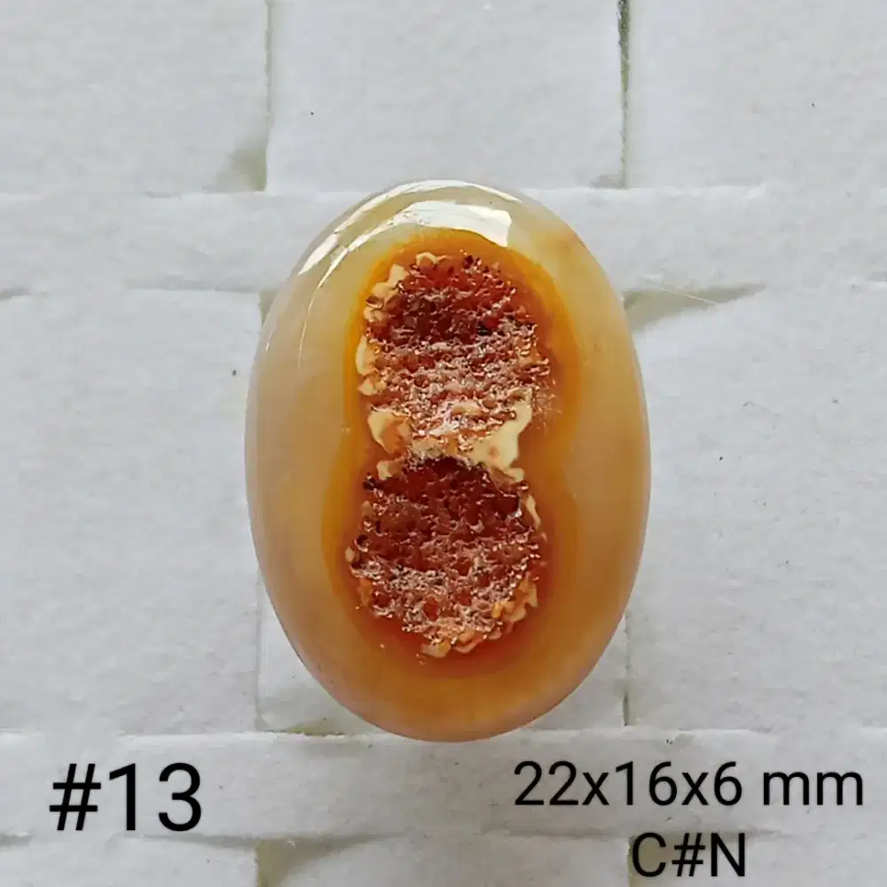 Batu motif sakral angka 8