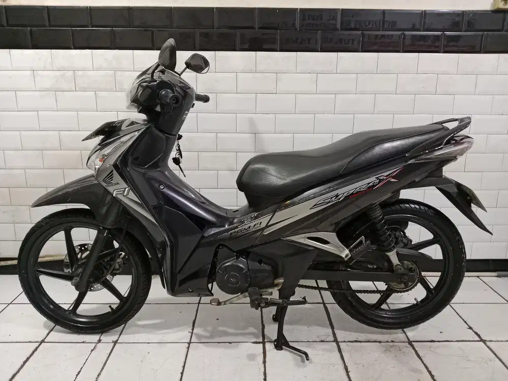 Honda supra helm in tahun 2012