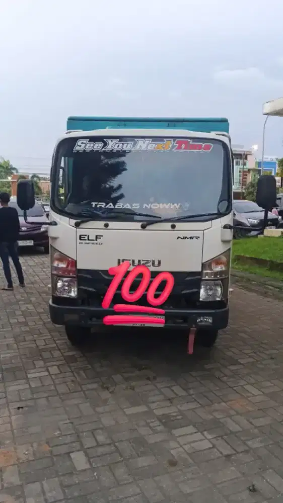Isuzu elf warna putih bak petak