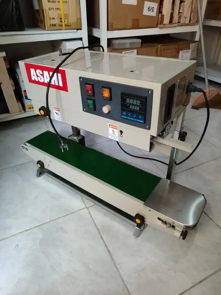 Mesin pres plastik berjalan / Continuous Band Sealer
