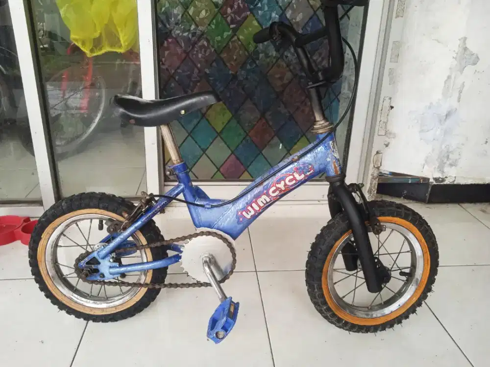 Sepeda anak kecil uk12 wimcycle asli
