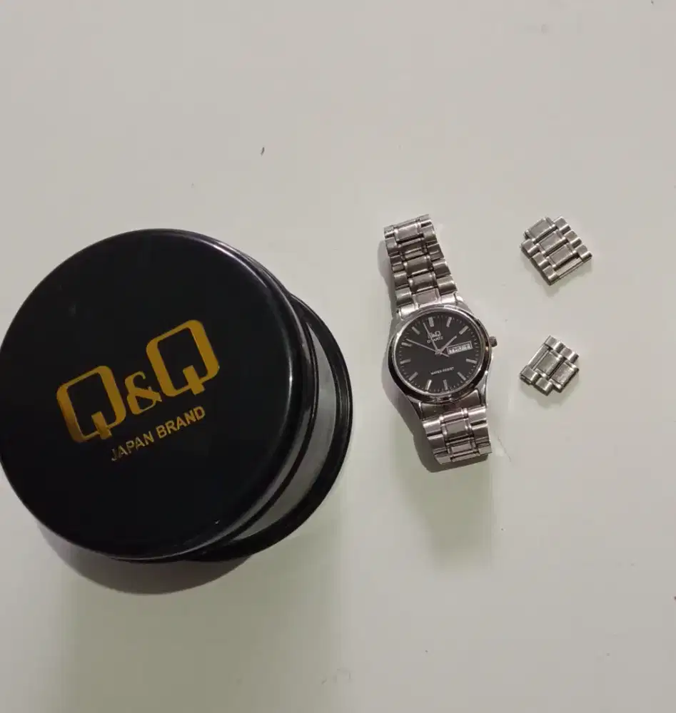 Q&Q Jam pria / wanita
