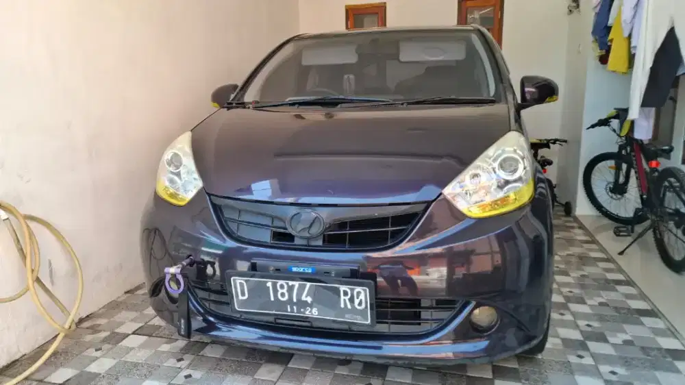 Daihatsu sirion 2011 manual ungu metalic