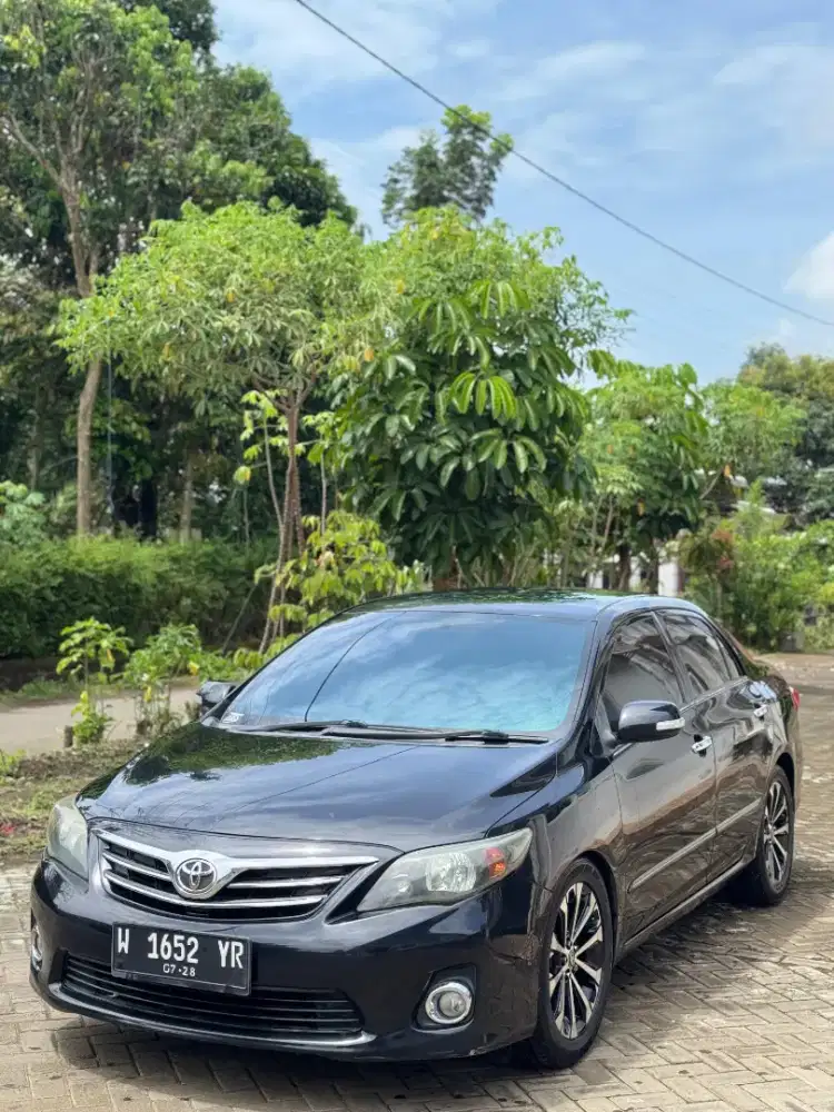 Mobil Toya Corolla Altis manual 2013