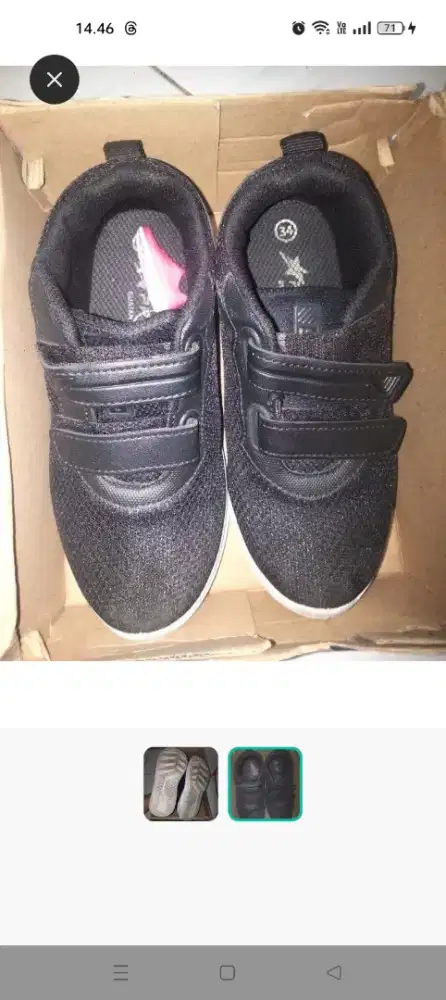 Sepatu hitam putih anak