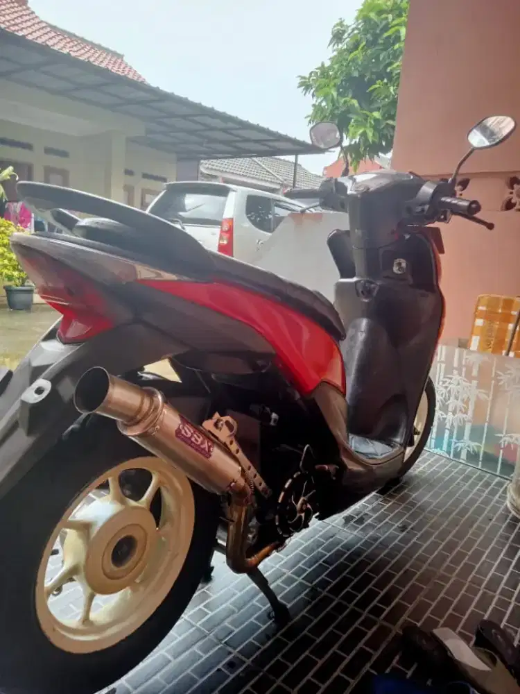 di lepas motor beat pop