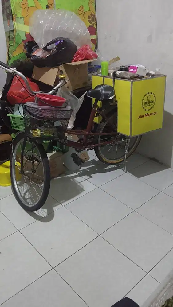 Sepeda dan Gerobak Jamu