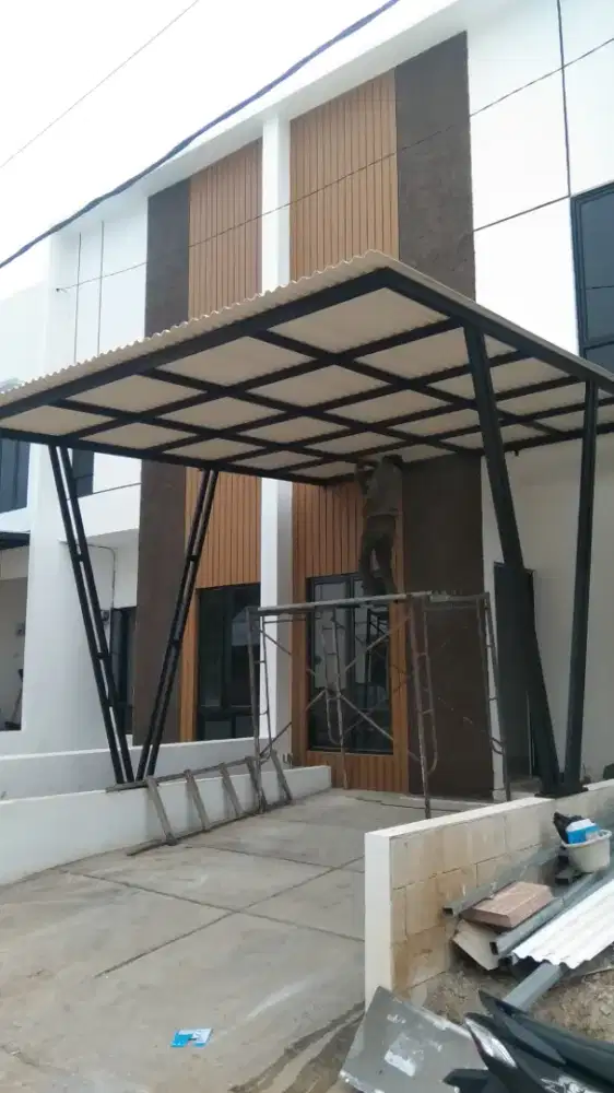 Canopi kaca dan baja ringan