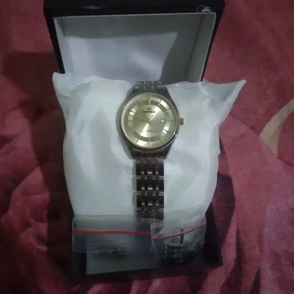 Jam tangan  cewek merk mirage gold silver