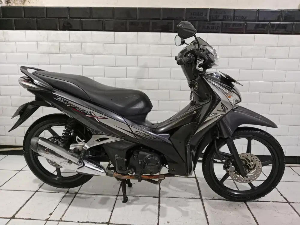 Honda supra helm in tahun 2012 mesin bagus