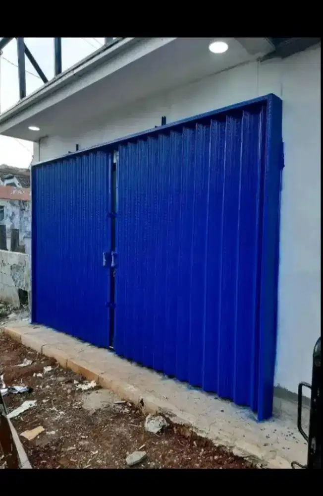 Rolling door folding gate servis rolling door
