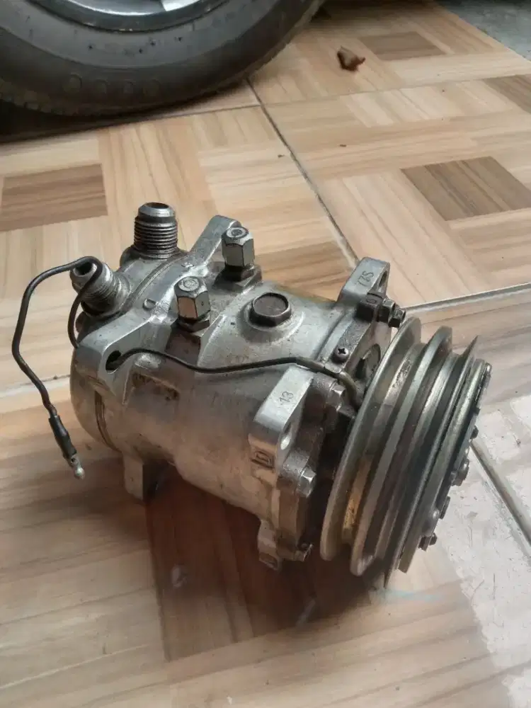 Dinamo kompresor AC mobil