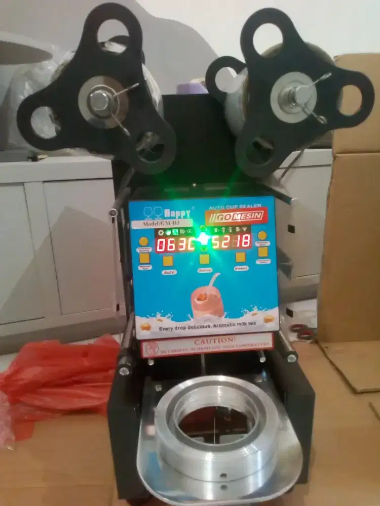 Sealer minuman full otomatis