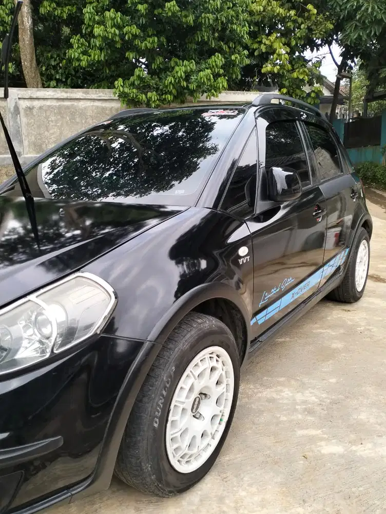 Suzuki SX4 2011 Bensin